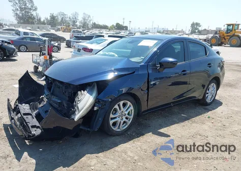 2017 Toyota Yaris Ia из США, поврежденный, VIN 3MYDLBYV3HY192036